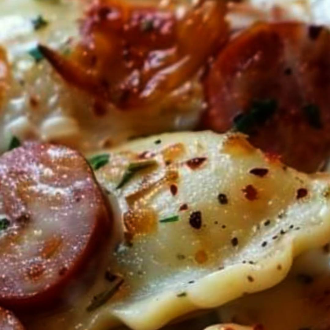 Recipe for a slow cooker dish with pierogies and sausage.